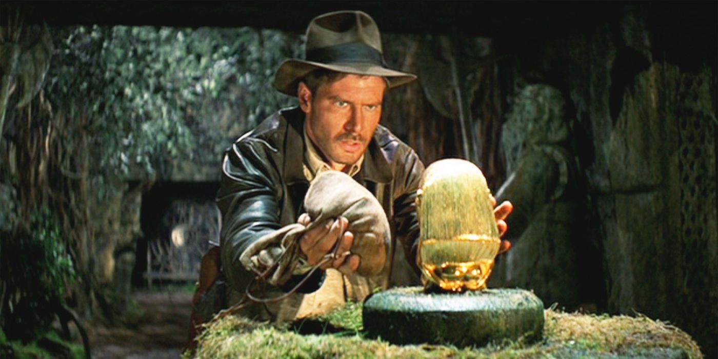 Indiana Jones (Harrison Ford) taking the artifact in Raiders of the Lost Ark