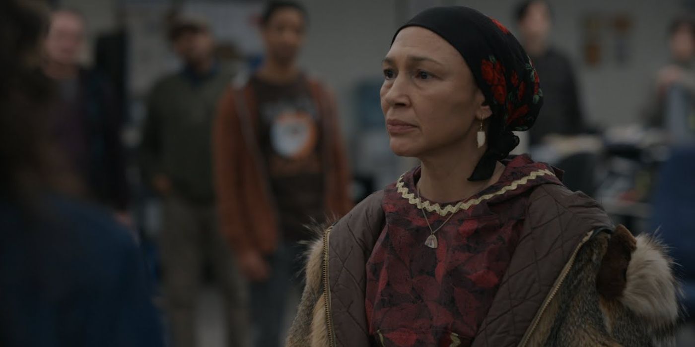 Irene Bedard as Sylvie Nanmac looking sad and angry in Alaska Daily