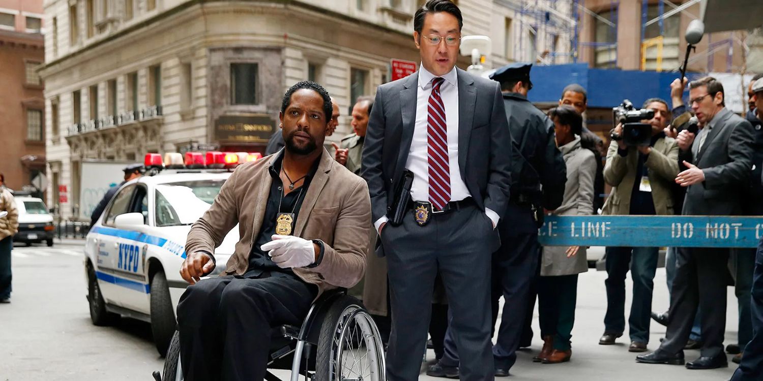 Blair Underwood as Robert Ironside and Kenneth Choi as Captain Ed Rollins investigating an incident in Ironside