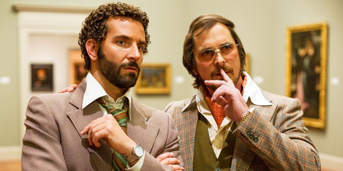 Irving Rosenfeld (Christian Bale) and Richie DiMaso (Bradley Cooper) in American Hustle