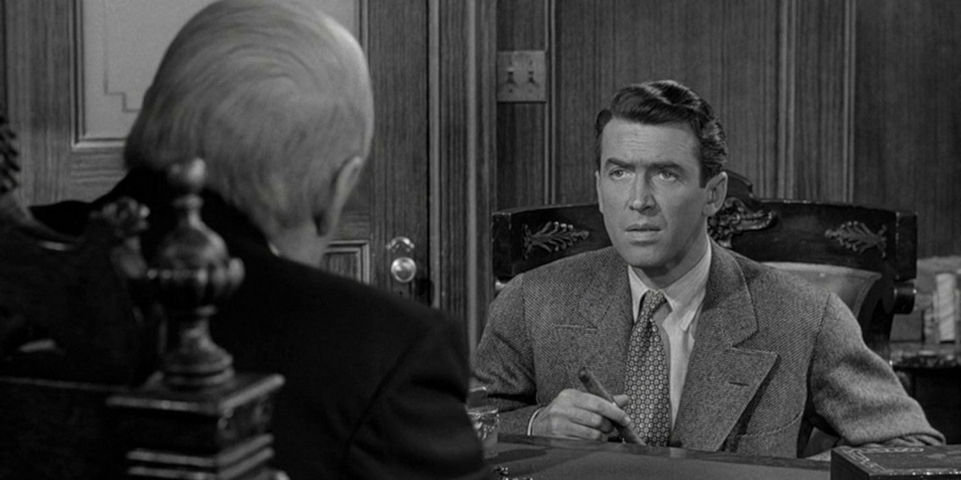 George holding a cigar in Potter's office in It's a Wonderful Life