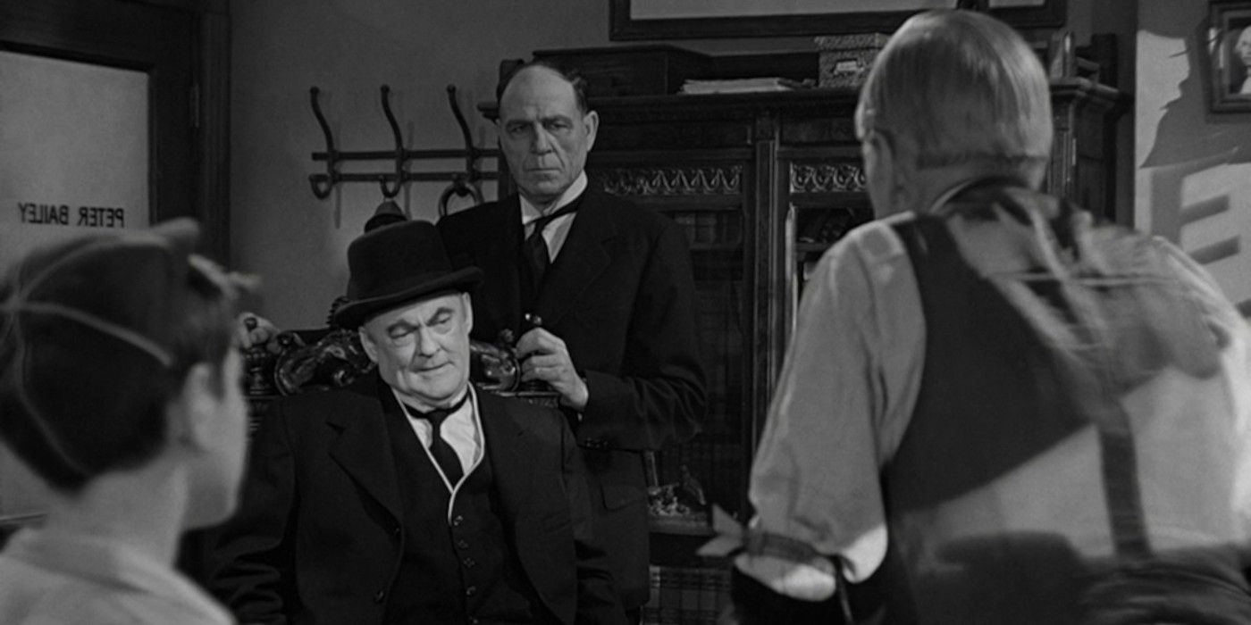 Potter talking to Pa Bailing in It's a Wonderful Life
