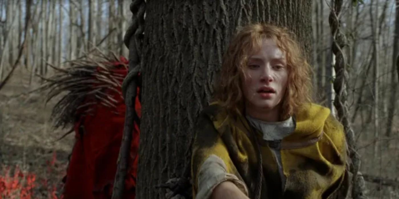 Ivy (Dallas Bryce Howard) from The Village hiding from a creater in the woods