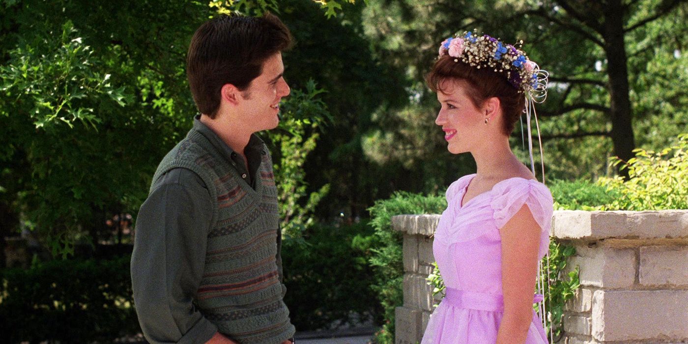 Jake and Sam smiling at each other in Sixteen Candles