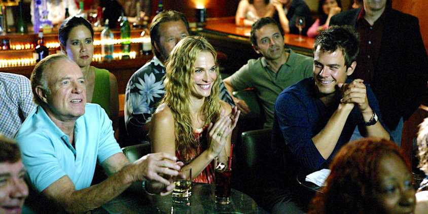 James Caan and Josh Duhamel smiling and clapping in the crowd in Las Vegas