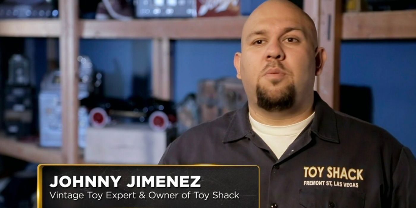 Johnny Jimenez the toy expert of Pawn Stars in his work uniform black shirt during interview
