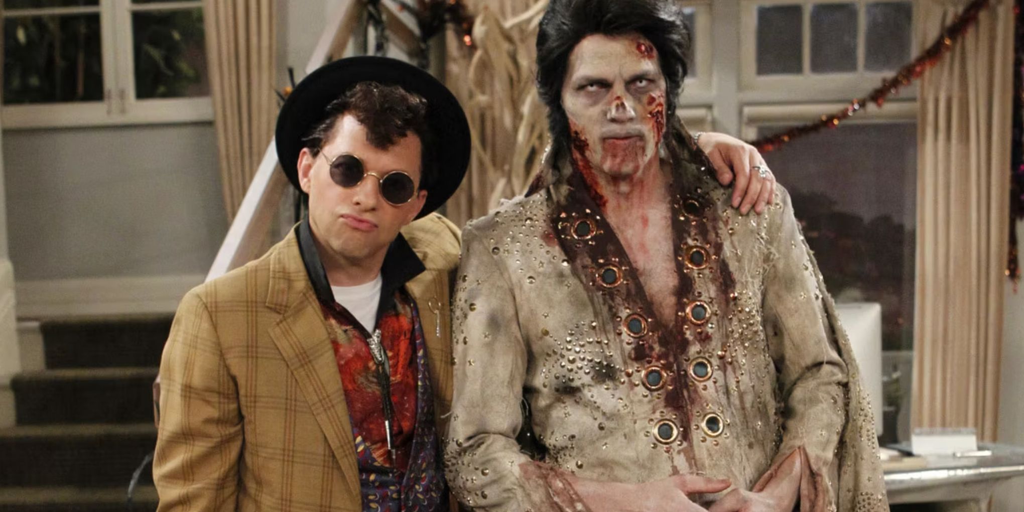 Jon Cryer as Ferris Bueller and Ashton Kutcher as a zombie Elvis in a Two and a Half Men Halloween episode