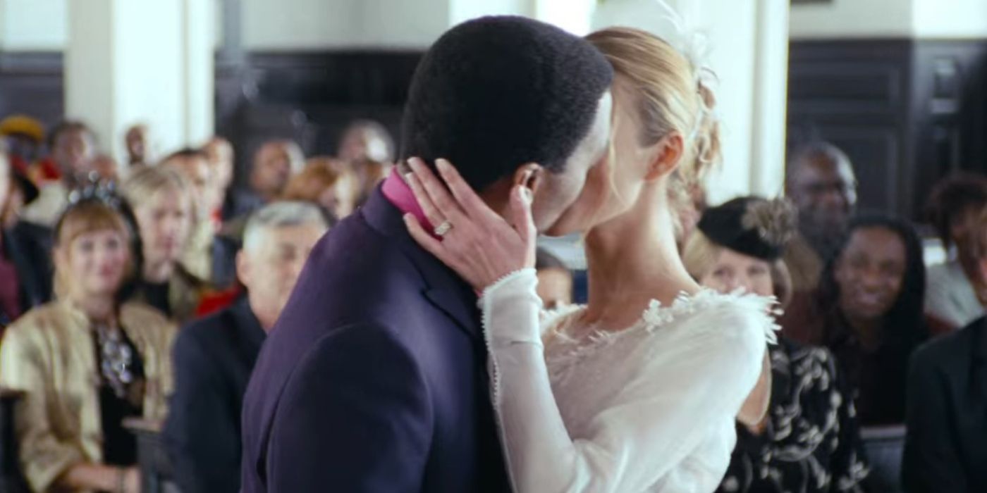 Juliet and Peter (Keira Knightley and Chiwetel Ejiofor) kiss at the wedding in Love Actually
