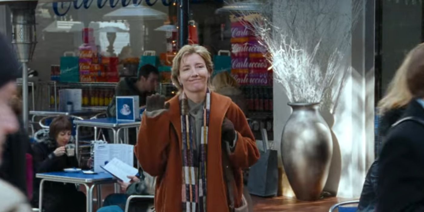 Karen (Emma Thompson) waving at Harry (Alan Rickman) in Love Actually