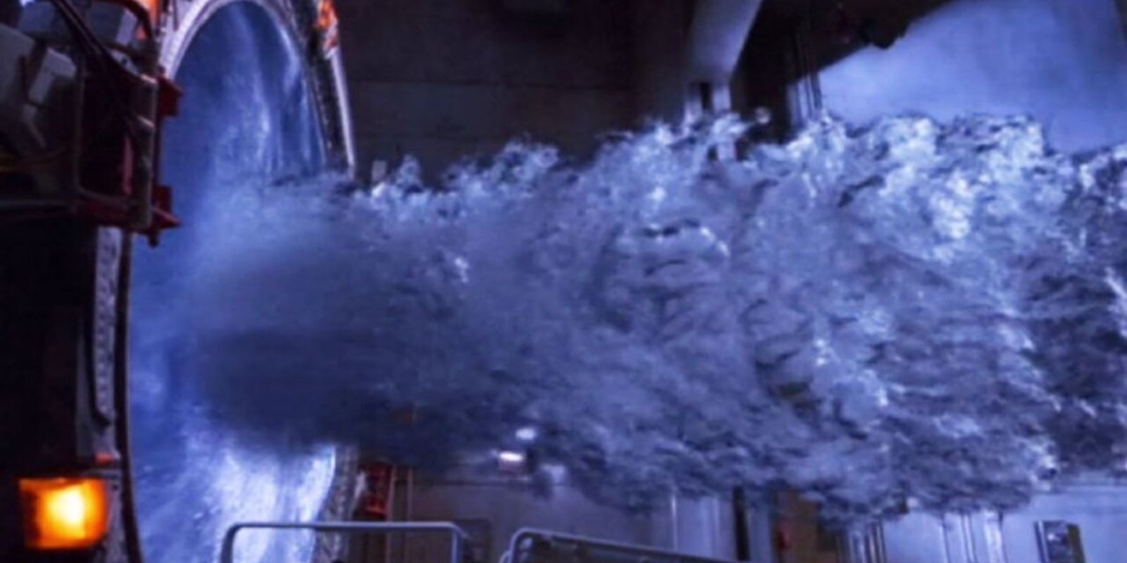 Water gushes out of the unstable vortex in Stargate.