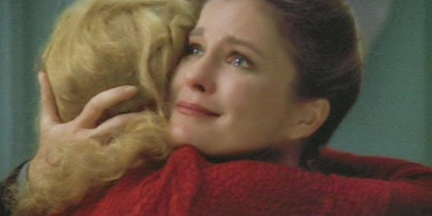 Kes and Janeway hug during their emotional farewell in Star Trek: Voyager season 4.