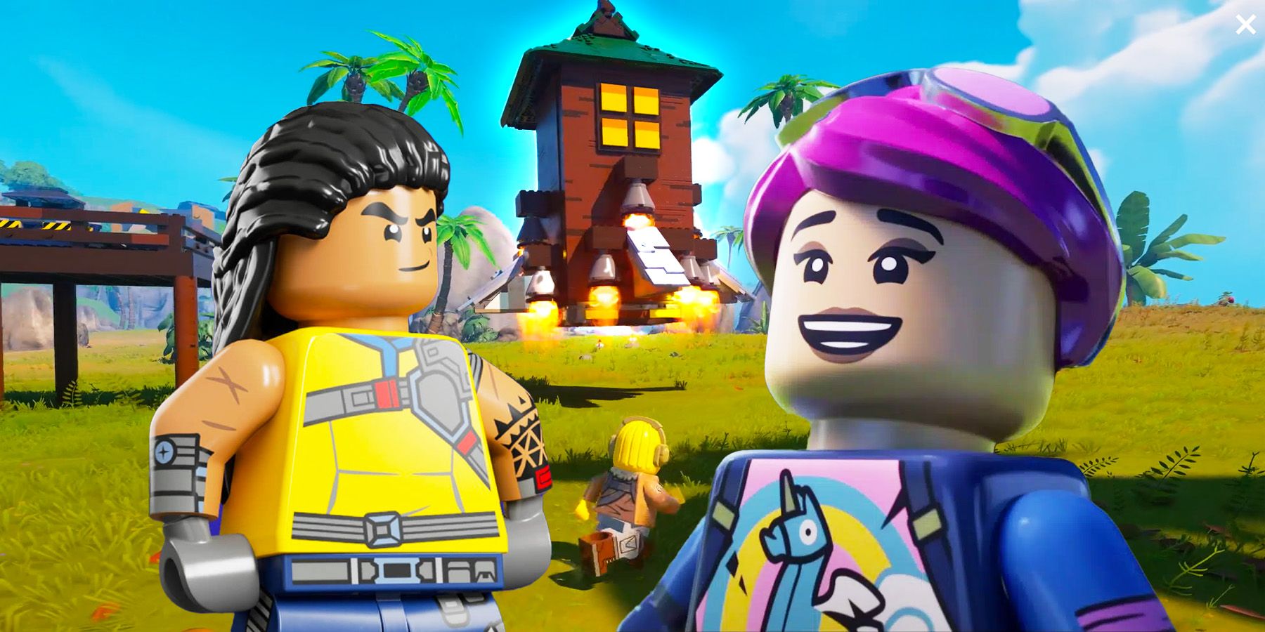Two player outfits in Lego form in front of a custom Rocket Ship in Lego Fortnite.