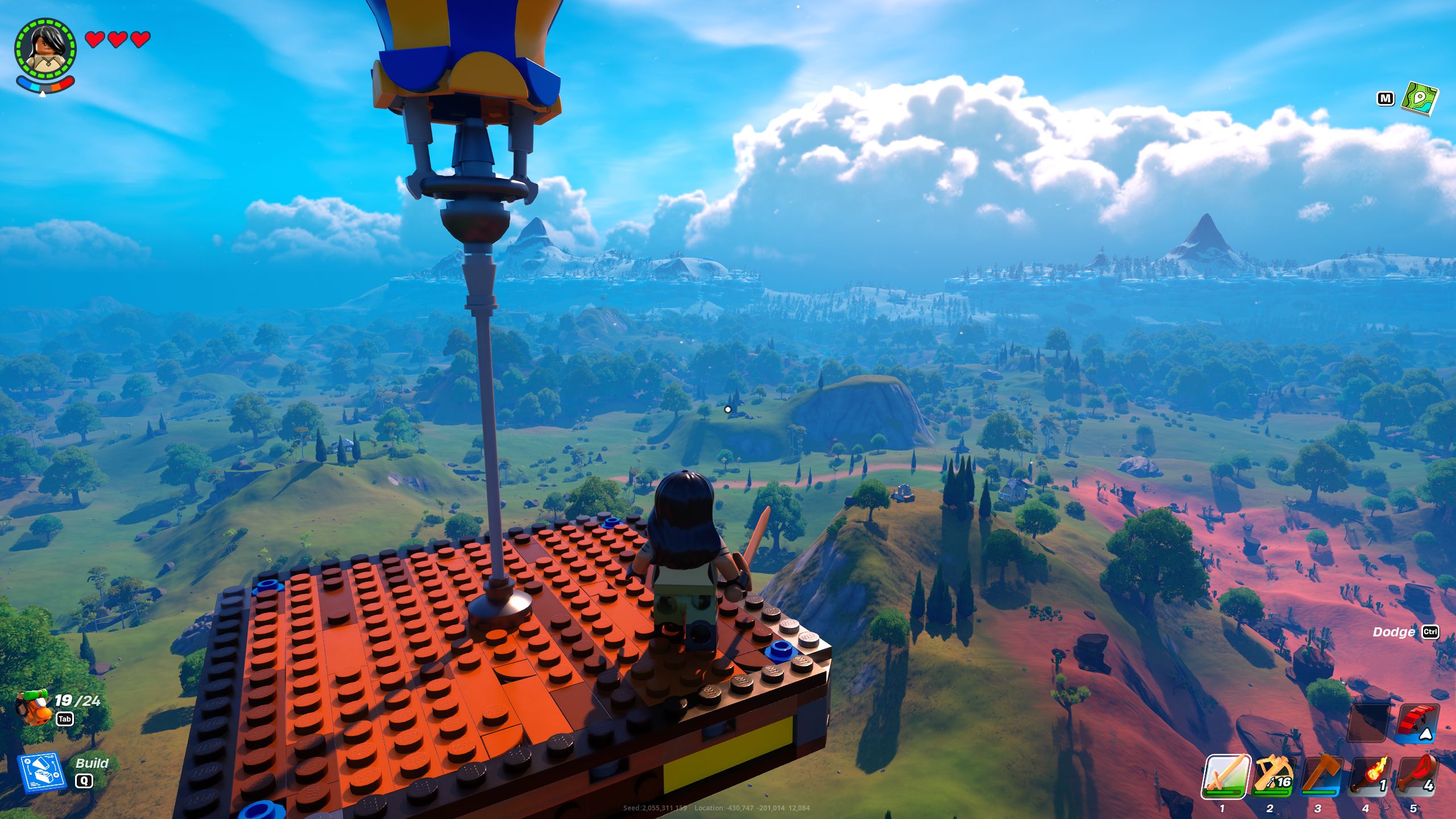 LEGO Fortnite Minifigure Standing On Platform Held Up By Large Blue Balloon Admiring Grassy Hills And Snowy Mountain Ranges