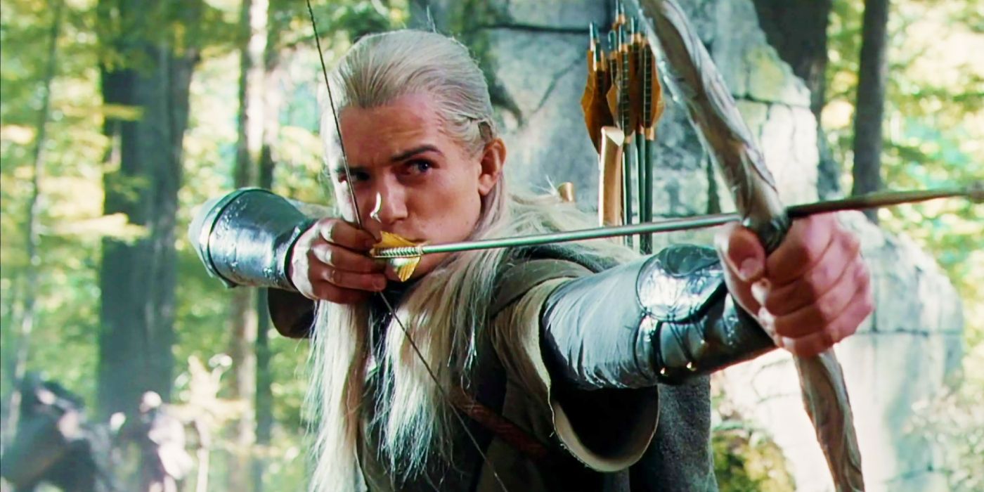 Legolas played by Orlando Bloom with his bow at full draw in The Lord of the Rings The Fellowship of the Ring.