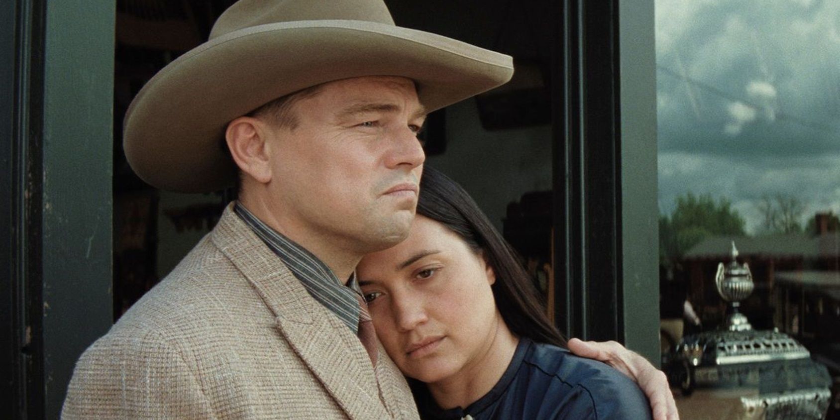 Leonardo DiCaprio's Ernest comforts Lily Gladstone's Mollie in Killers of the Flower Moon