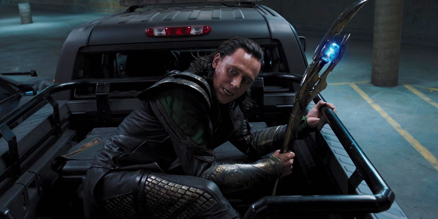 Loki hunches over in a truck as he escapes in The Avengers