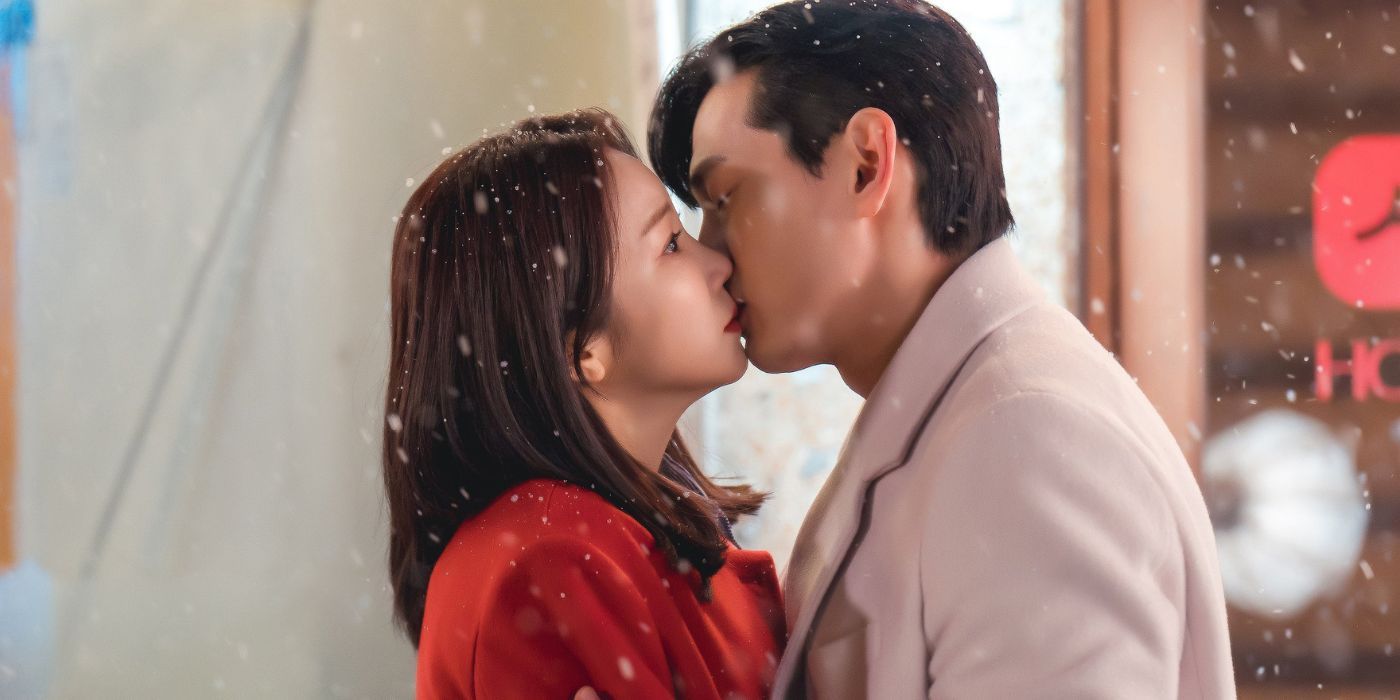 Kim Ok-vin as Yeo Mi-ran and Teo Yoo as Nam Kang-ho with eyes open in surprise as they kiss in Love to Hate You