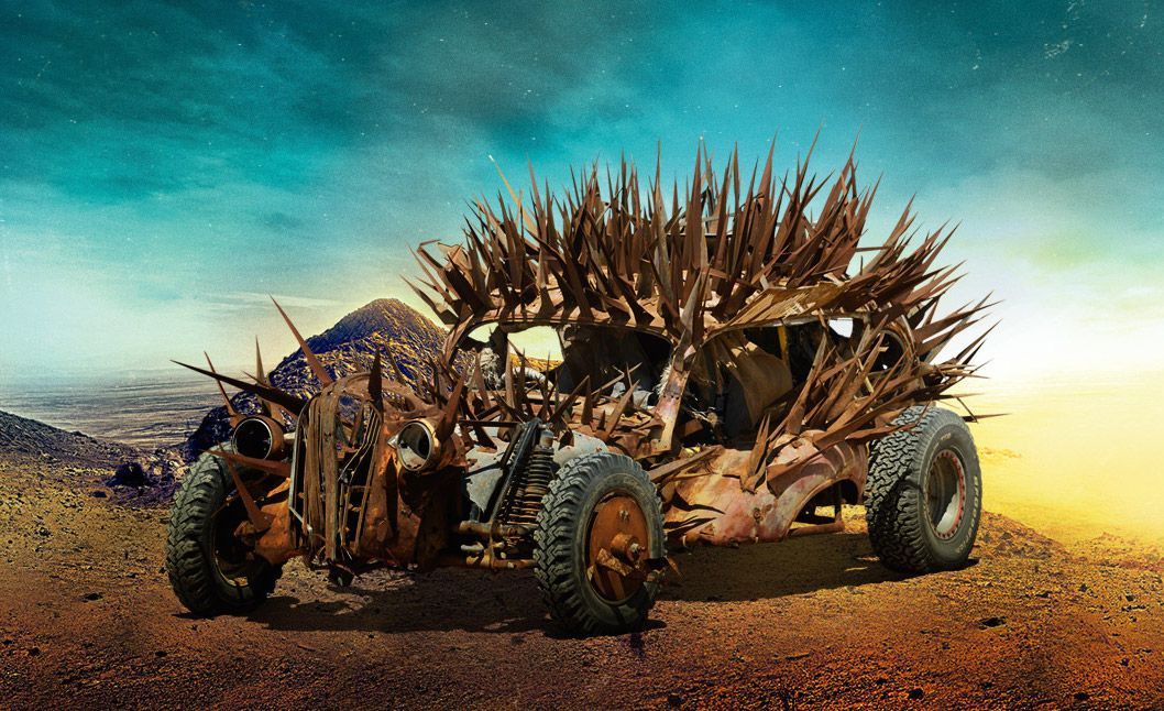 Mad Max car with spikes in desert.