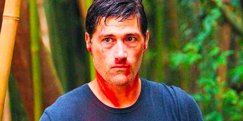 Jack Shephard (Matthew Fox) standing in the jungle with a bloody face in Lost