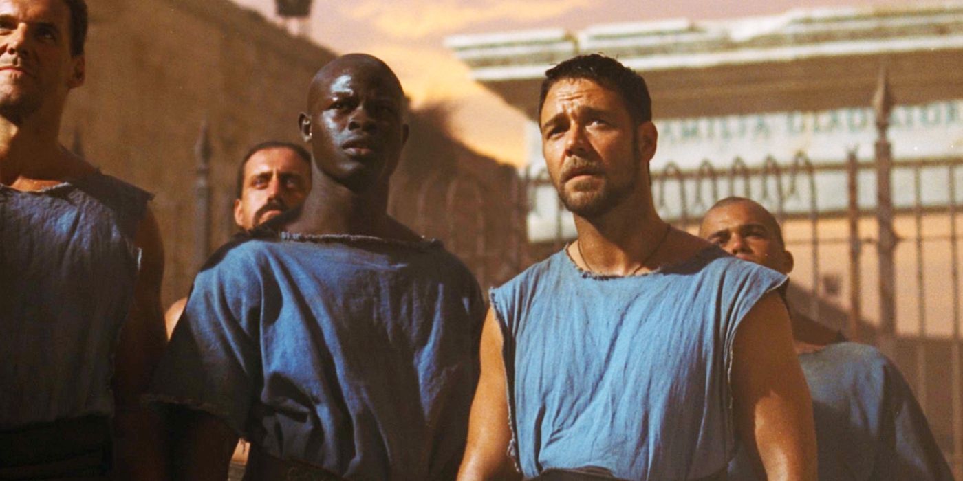 Maximus (Russell Crowe) and Juba (Djimon Hounsou) standing next to each other in Gladiator