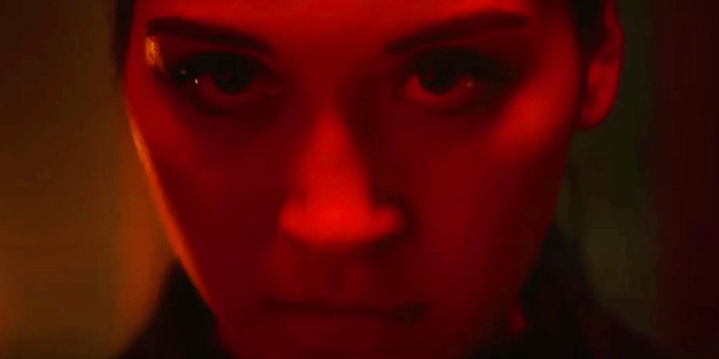 Maya Lopez in red light looking at the camera in Echo trailer