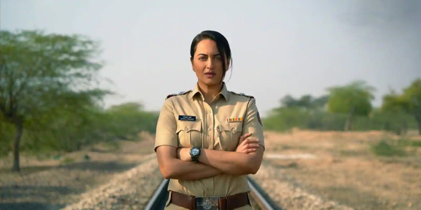 Anjali Bhaati (Sonakshi Sinha) with her arms folded on a railway track in Dahaad