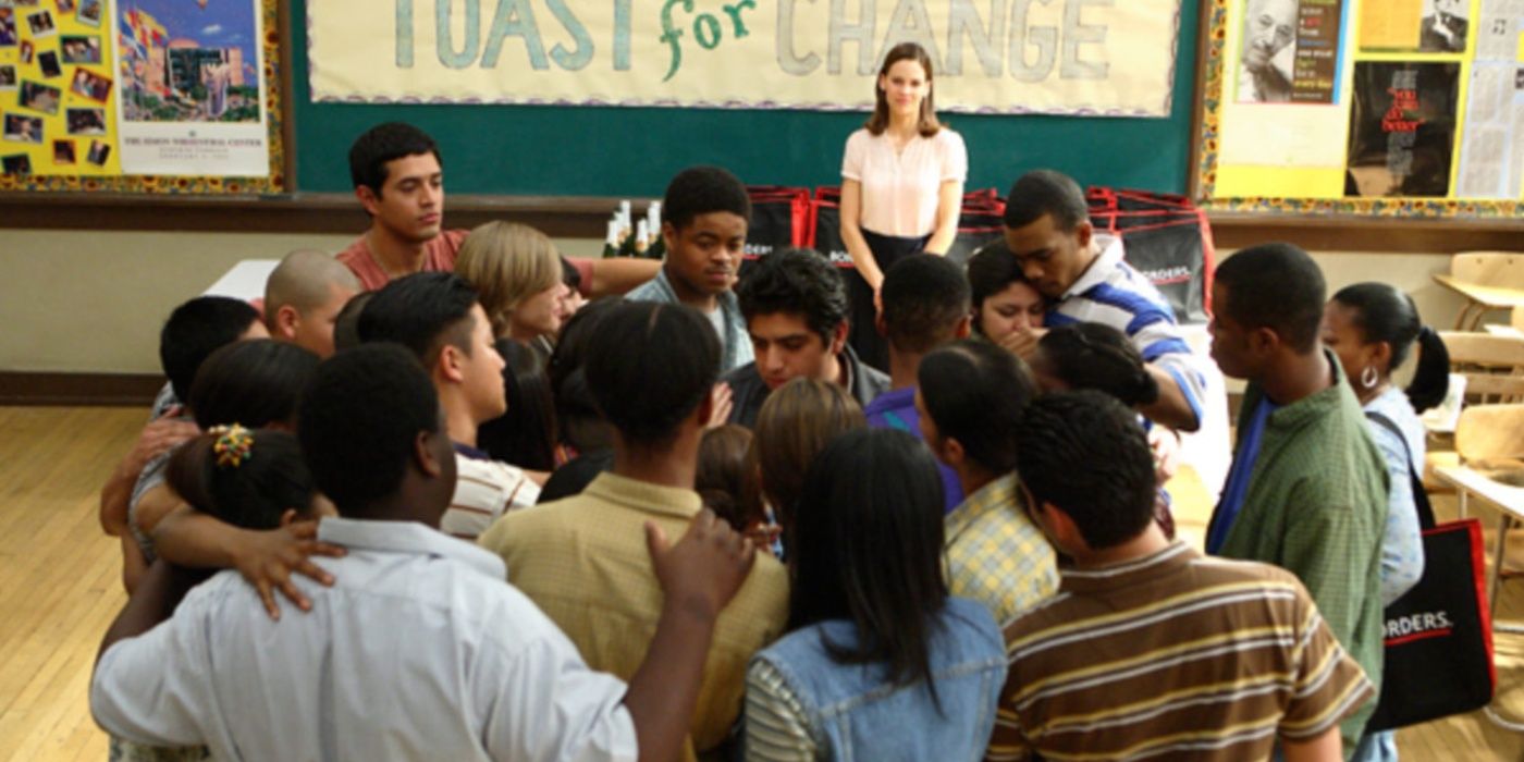 Erin (Hilary Swank) watches her students group hug Freedom Writers