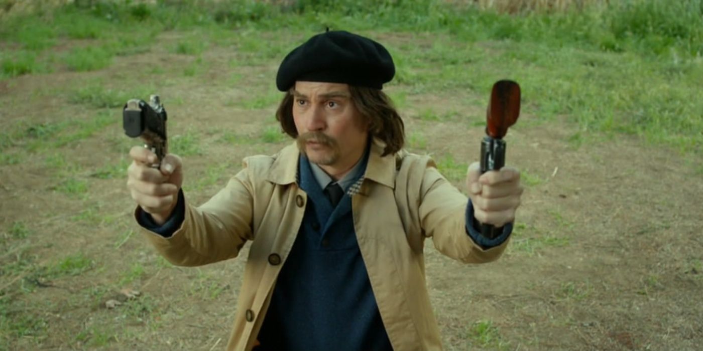 Johnny Depp as Guy LaPointe holding up two pistols in Tusk