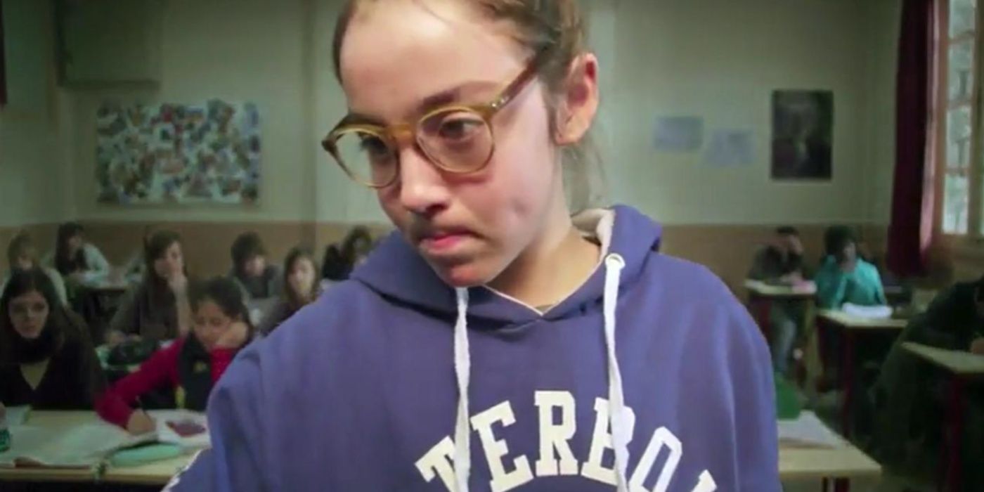 Justine walks out of class in Junior