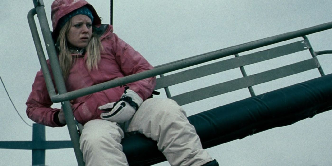 Parker (Emma Bell) frightened on the ski lift in Frozen