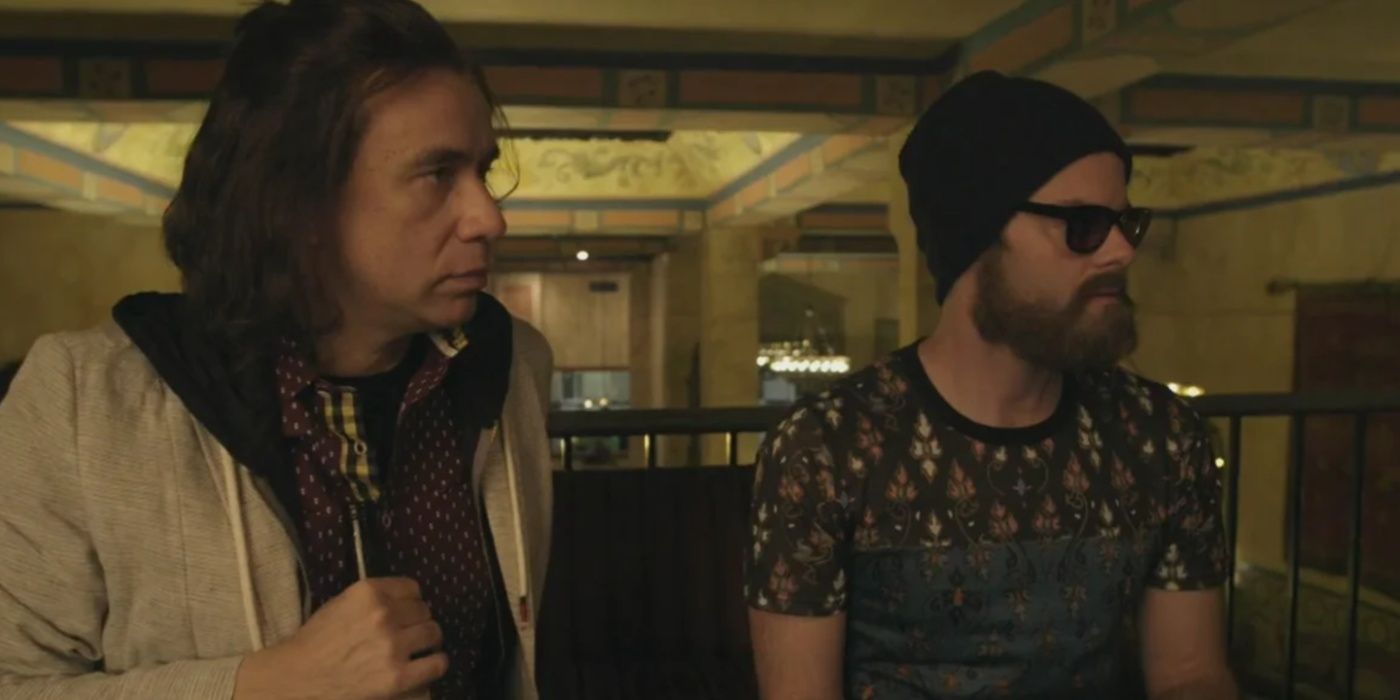 Two hipster journalists look worried in Documentary Now!