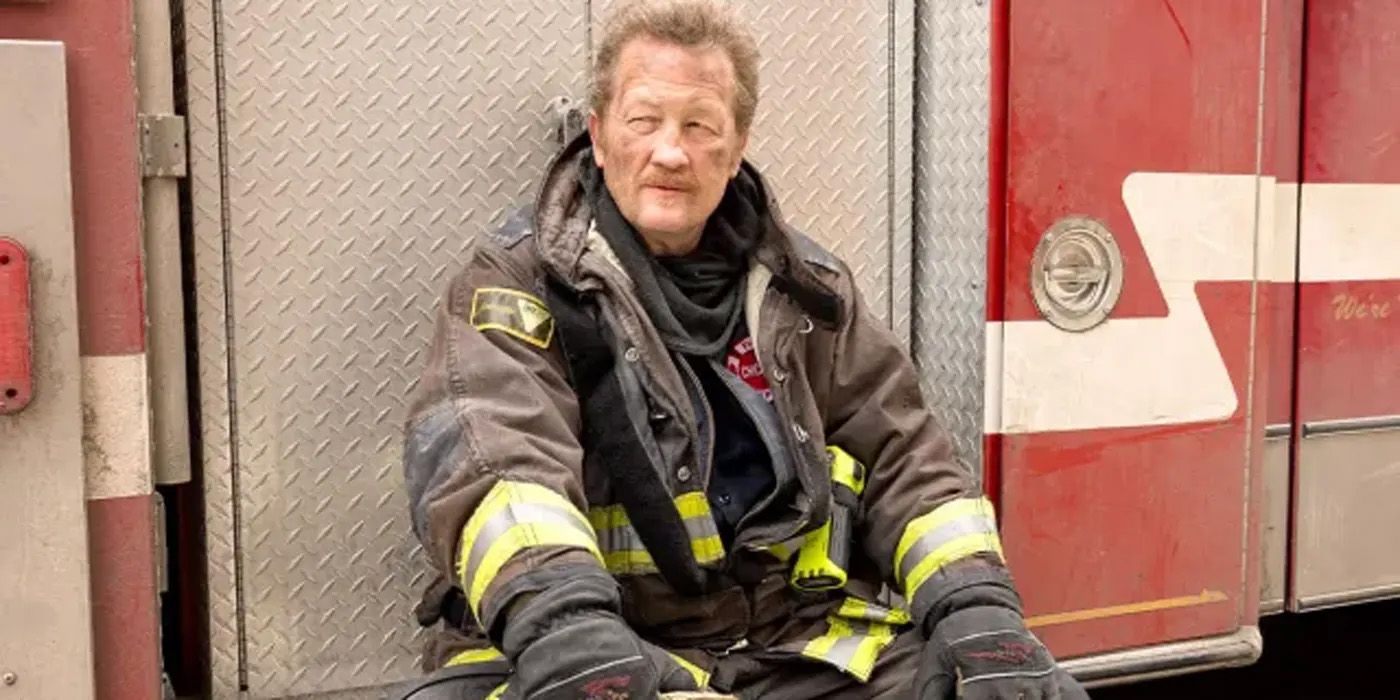 Mouch sitting on a fire truck in Chicago Fire