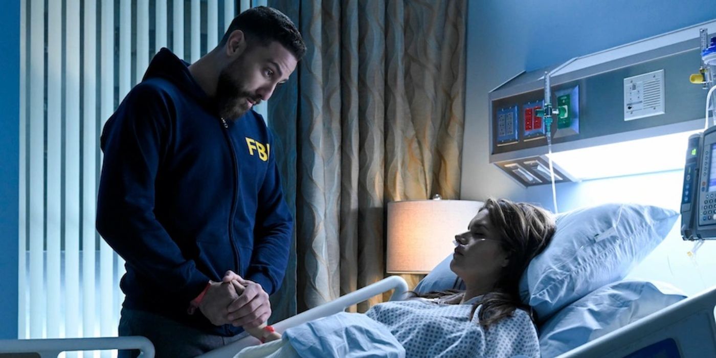 OA (Zeeko Zaki) holding Maggie's (Missy Peregrym) hand as she recovers in the hospital in FBI