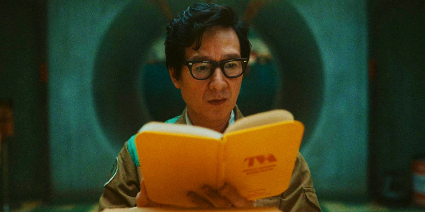 Ouroboros reading the new TVA guidebook in Loki season 2