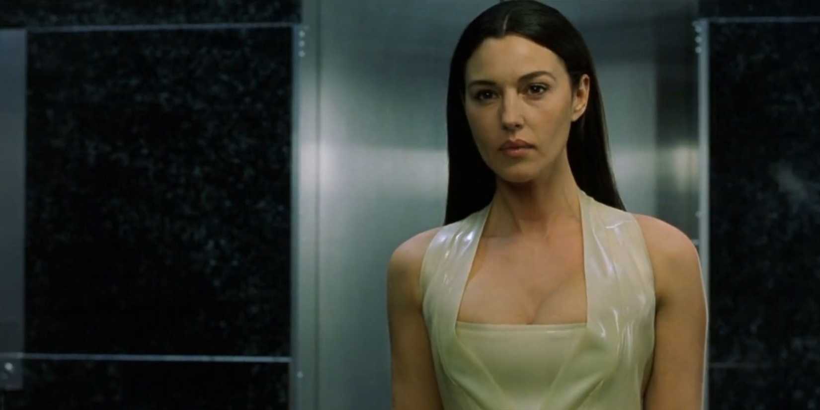 Monica Bellucci as Persephone looking off-screen in The Matrix Reloaded