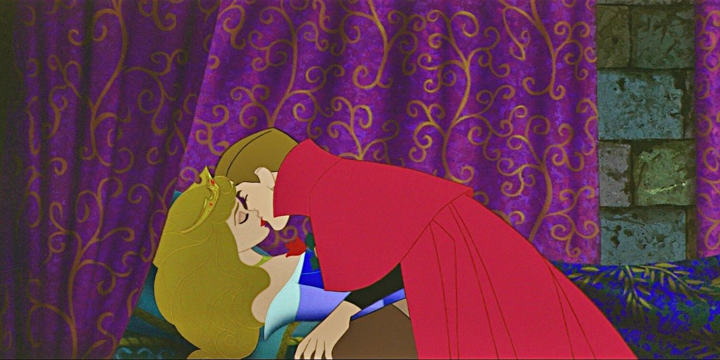 Prince Phillip kissing Aurora as she's sleeping