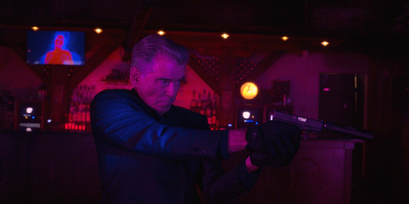 Pierce Brosnan as Charlie with gun in club in Fast Charlie