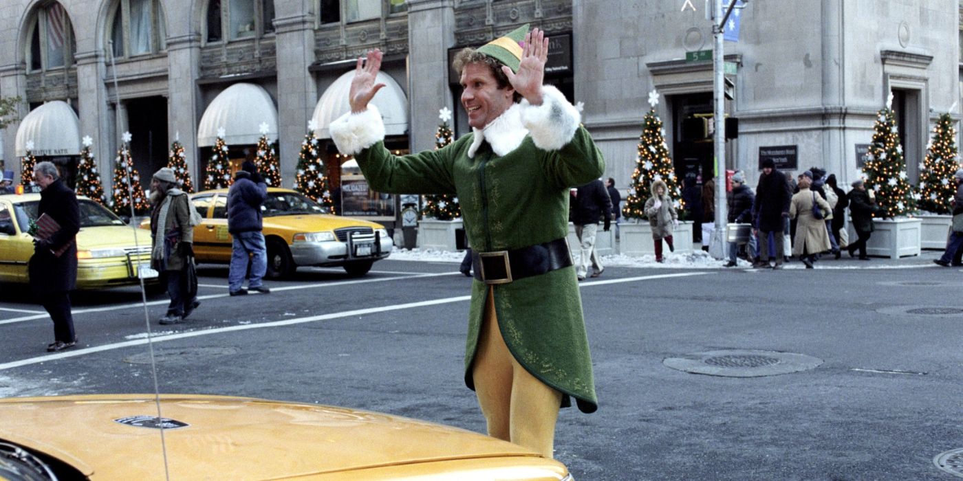 Buddy frente a un taxi de Nueva York en Elf