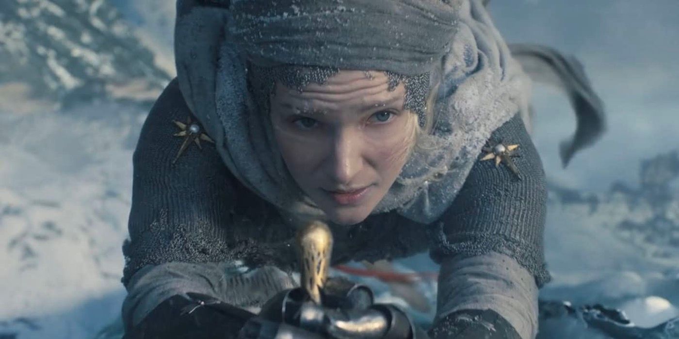 Galadriel using a blade to hold onto an ice wall in The Rings of Power season 1