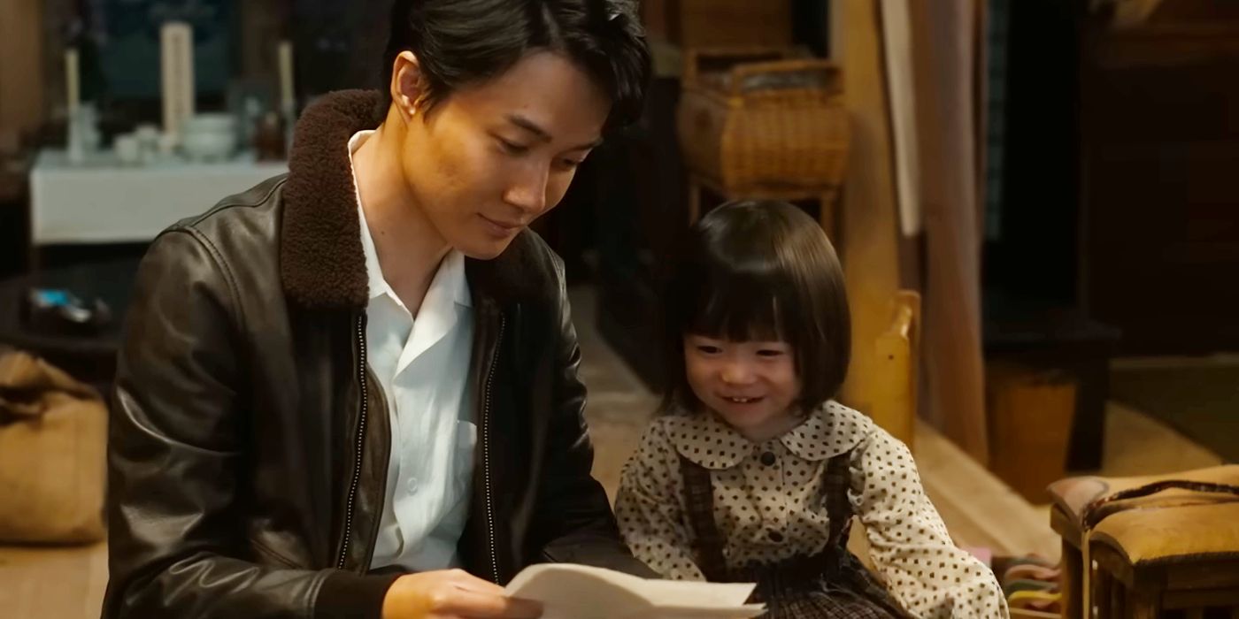 Ryunosuke Kamiki as Koichi and Sae Nagatani as Akiko Looking at a Piece of Paper in Godzilla Minus One