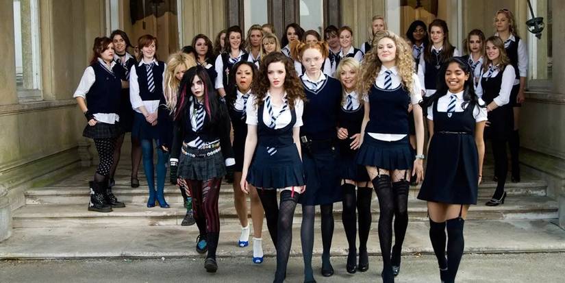 A large group of schoolgirls in uniform with Talulah Riley's Annabelle in front in St Trinian's.
