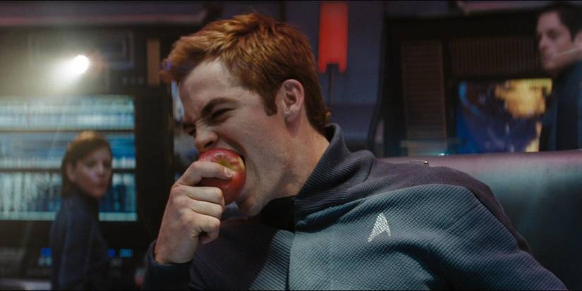 Star Trek (2009). Chris Pine as Cadet James T. Kirk. Kobayashi Maru simulation, eating apple.