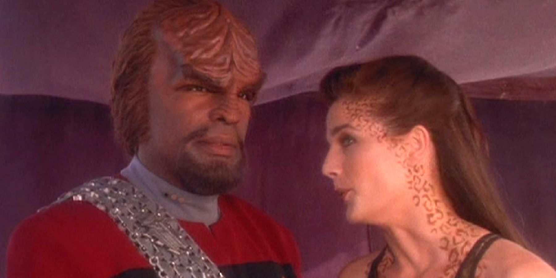 Worf in full uniform and Dax in a swimsuit in DS9