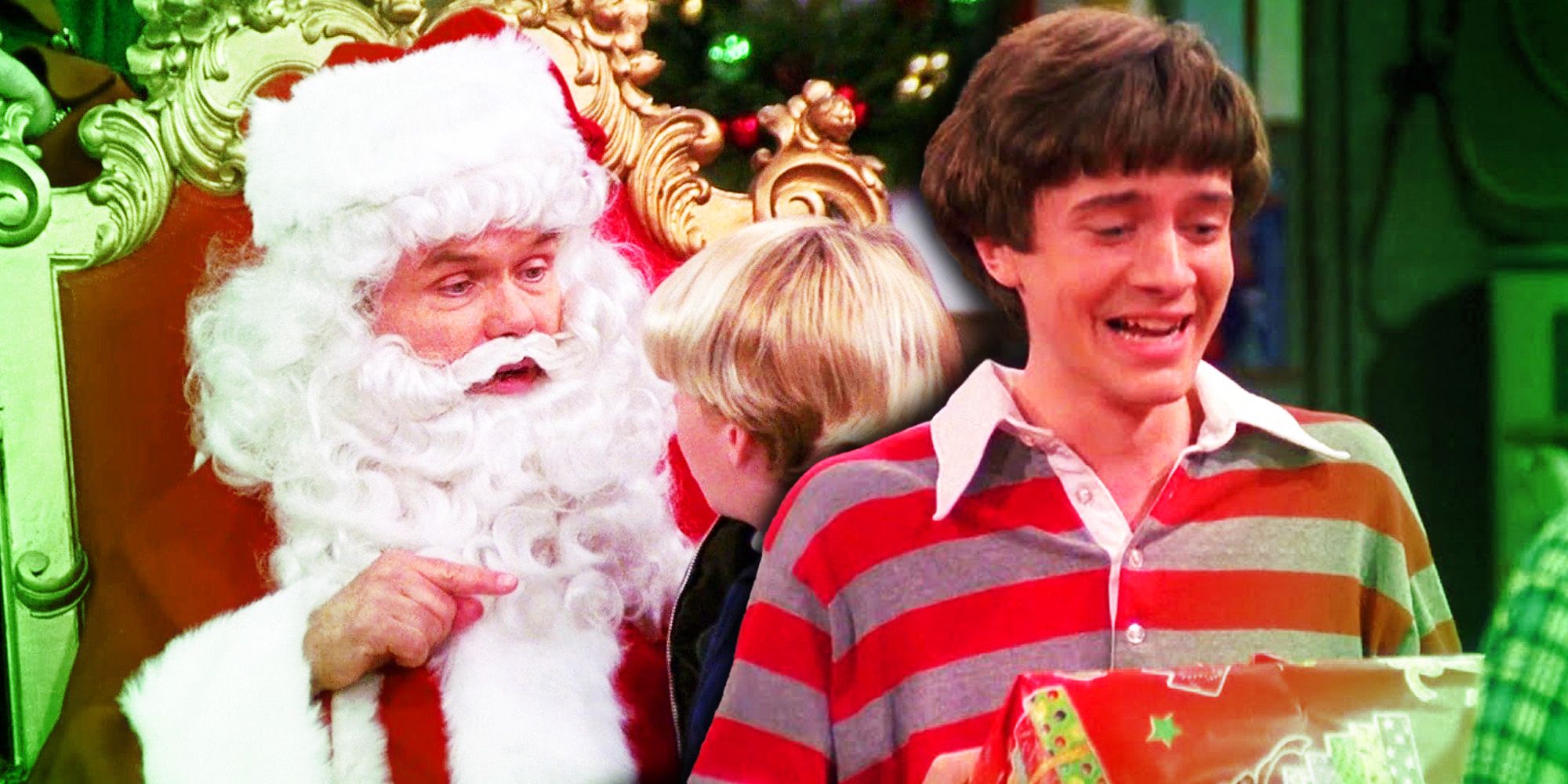 Red dressed up as Santa Claus and Eric holding a present in That '70s Show.