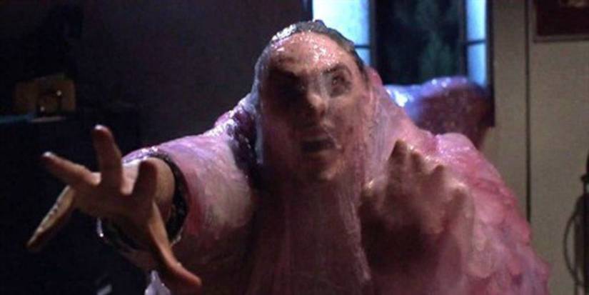 The Blob absorbing a man in the 1988 film.