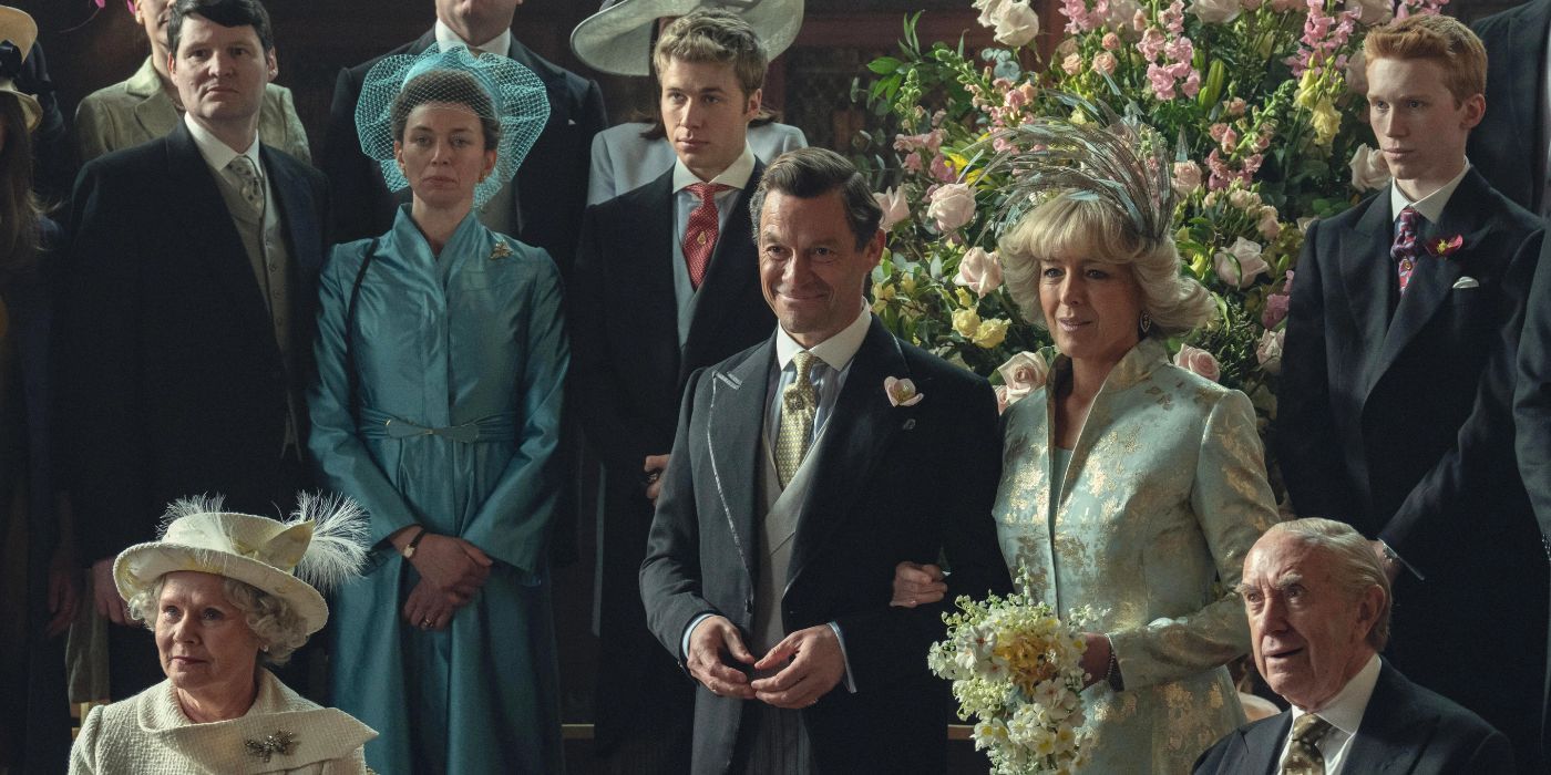 The Crown season 6 main cast consisting of Queen Elizabeth, Prince Philip, Prince Charles, Prince William, Prince Harry, Princess Anne, and Camilla at Charles' wedding in The Crown finale