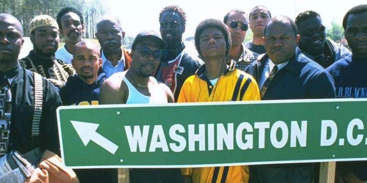 The entire cast of Get on the Bus standing behind a Washington D. C. sign in Get on the Bus