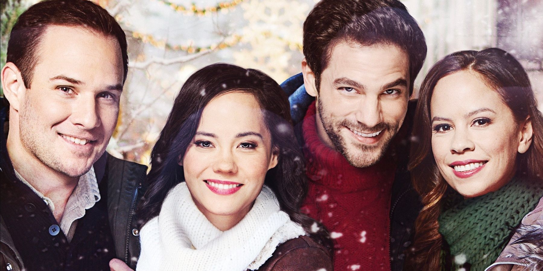 The four lead characters smiling for the camera in their winter clothes in A Christmas Movie Christmas
