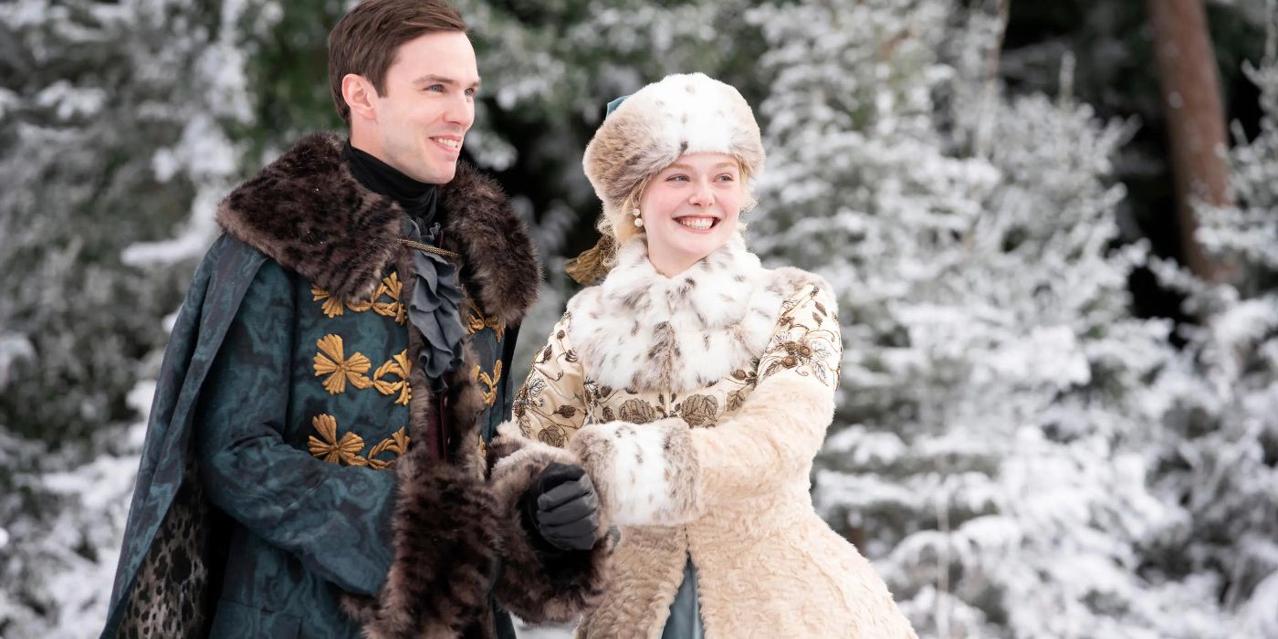 Elle Fanning and Nicholas Hoult Catherine and Peter in a snowy field in The Great