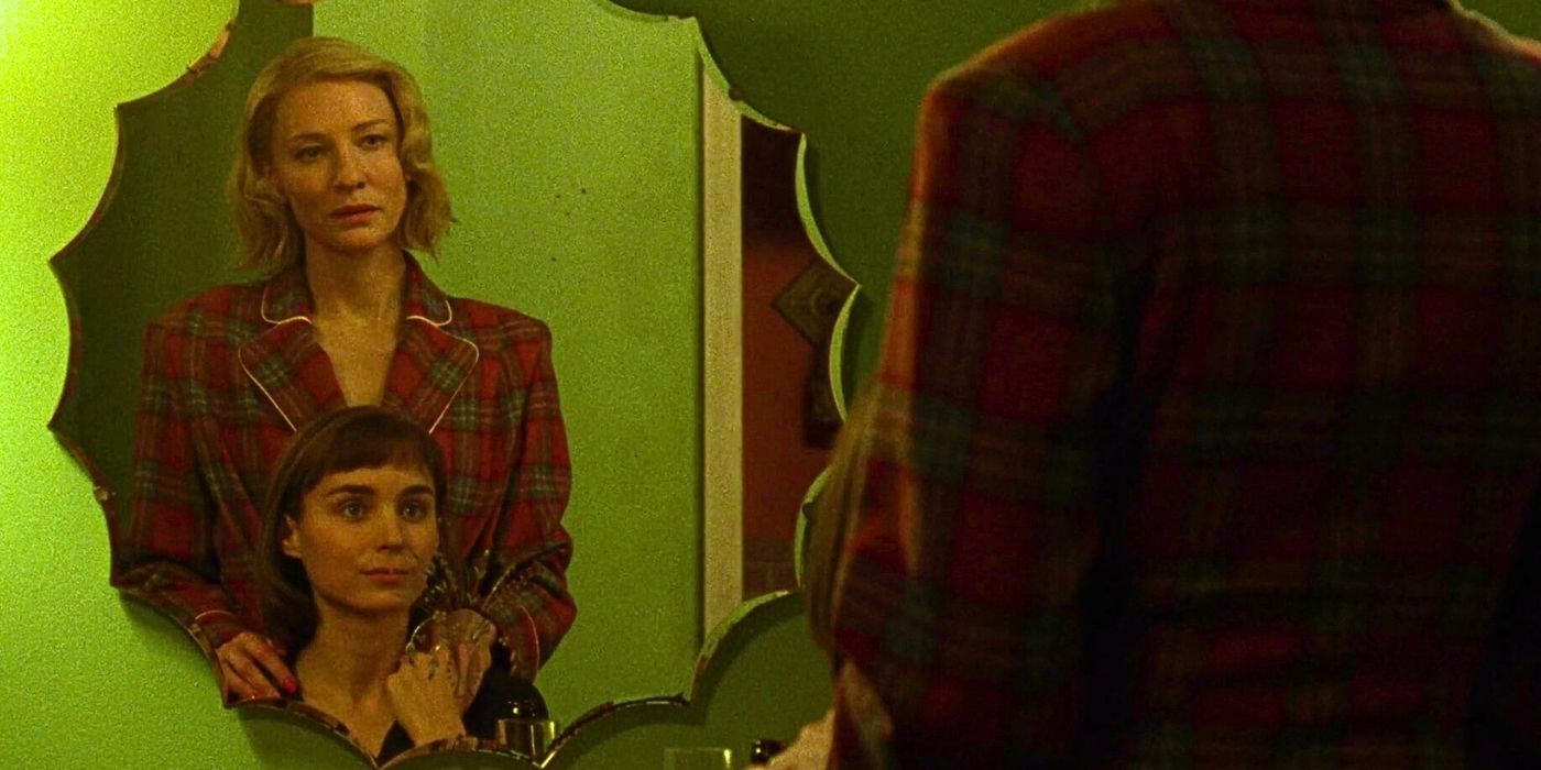 Therese (Rooney Mara) and Carol (Cate Blanchett) look into a mirror on New Years Eve in Carol